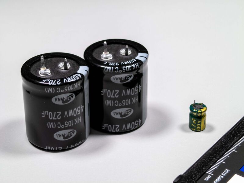 File:Mains bulk capacitors big and small.jpg